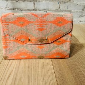 Stella & Dot Aztec clutch in orange and gold